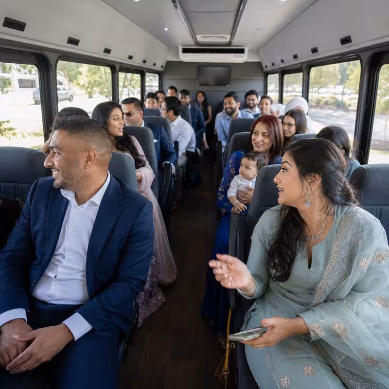 Group boarding a white charter bus for Private Event Transportation transportation in Augusta