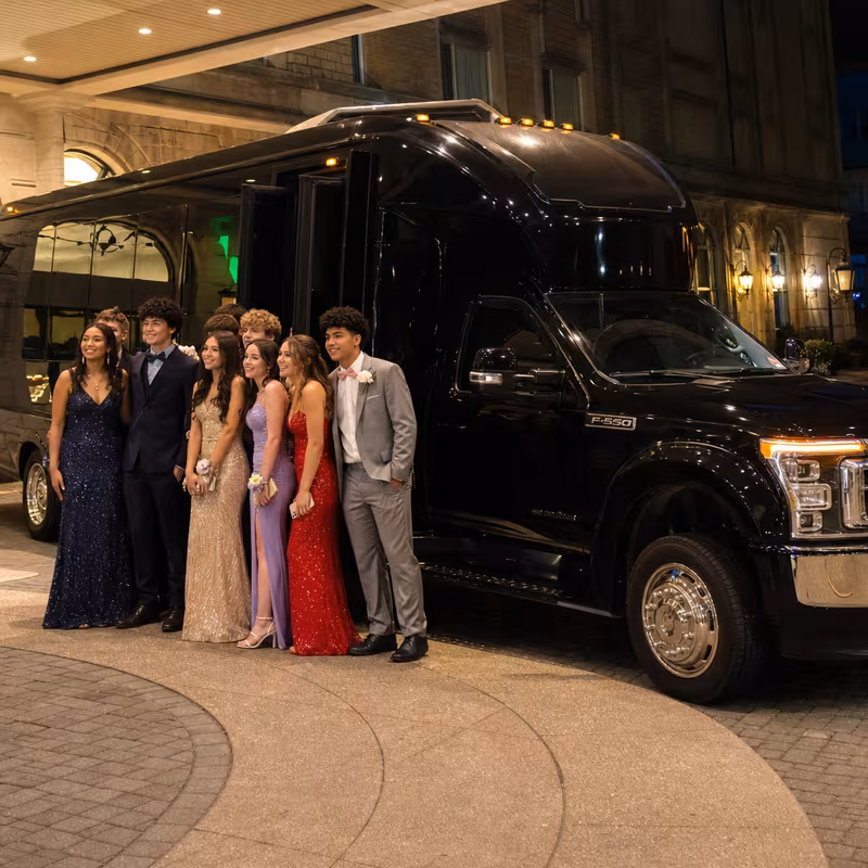 Party bus interior with wraparound leather seating and LED lighting in Augusta