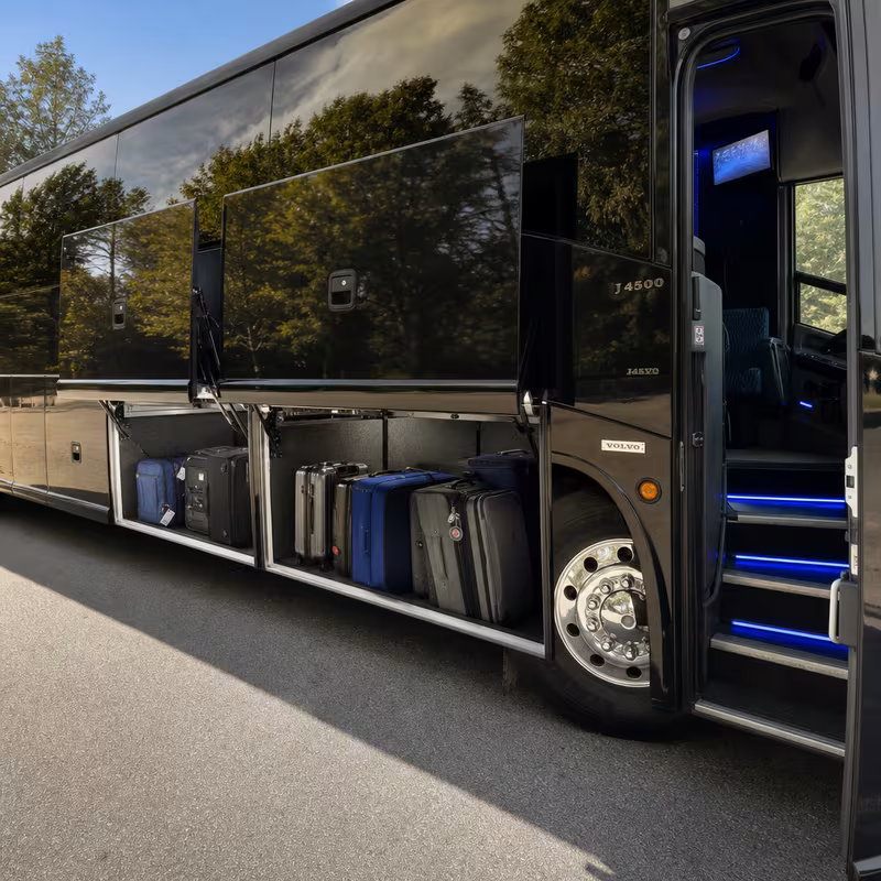 Party bus interior with wraparound leather seating and LED lighting in Augusta